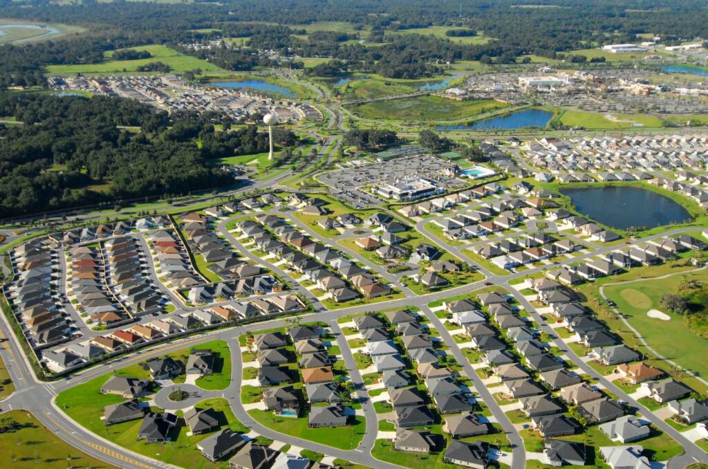 Aerial view of multiple houses in a community