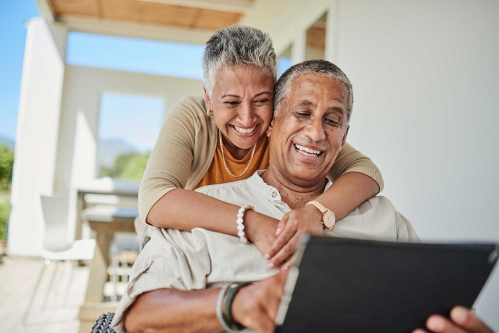 Older couple on a tablet together